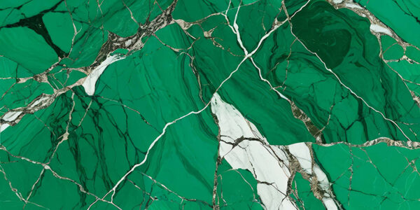 abstract background with a green and white marble texture. The marble has a glossy finish and appears to be polished to a shiny surface. The color of the marble is a deep, vibrant green with hints of white and gold. The texture is rough and uneven, with some areas appearing darker and others lighter. There are also a few thin, white lines that run diagonally across the image, creating a sense of depth and dimension. The overall effect is one of luxury and sophistication.