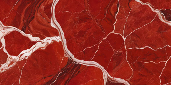 The image is an abstract background with a red and white marble texture. The marble has a deep red color with white veins running through it, creating a wave-like pattern. The veins appear to be jagged and uneven, with some areas appearing darker and others lighter. The texture of the marble is rough and uneven. The overall effect is one of depth and dimension.